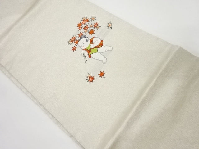 御所人形に紅葉模様織り出し名古屋帯